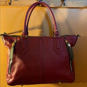 Deep red leather handbag